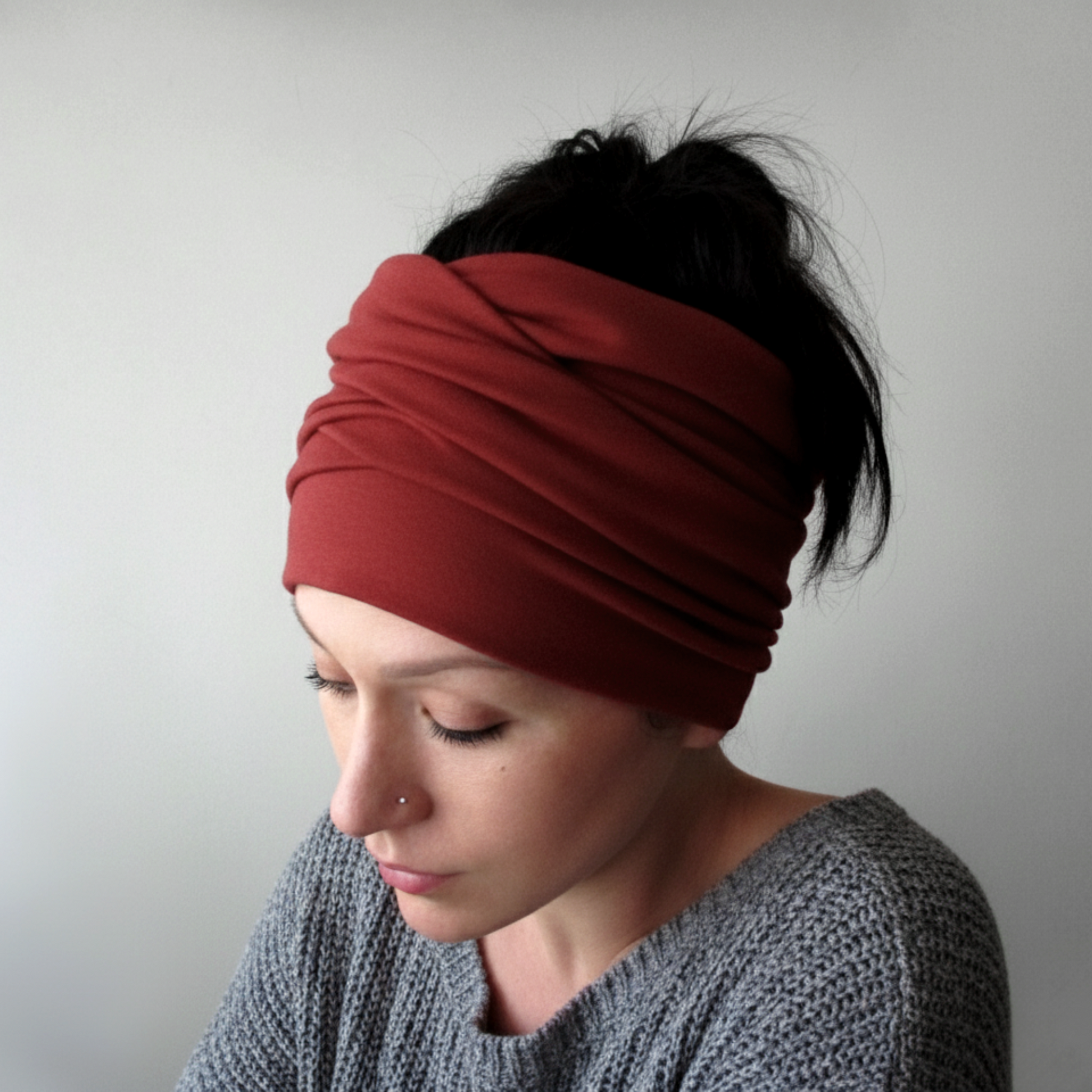 woman wearing a paprika red ecoshag head wrap