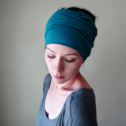 woman wearing a turquoise blue head wrap