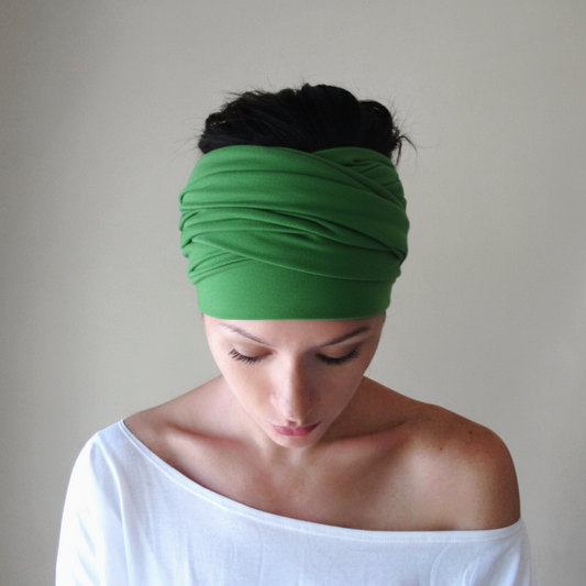 woman wearing green stretch head wrap