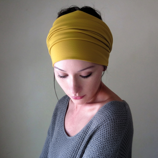 woman wearing a mustard yellow ecoshag head wrap