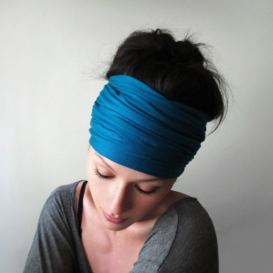 woman wearing an ecoshag peacock blue head wrap